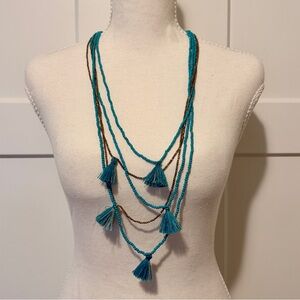 Multi-Strand Turquoise Colored Beaded Tassel Necklace Adjustable Pull Cord